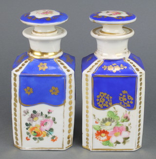 A pair of Paris Porcelain octagonal scents decorated with flowers 7" 