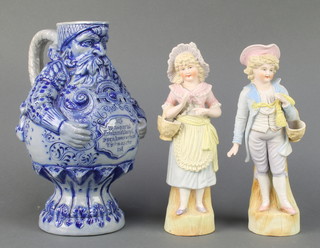 A pair of 19th Century bisque figures of a young lady and gentleman 9" and a German salt glazed ewer in the form of a portly gentleman 10" 