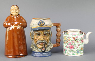 A Continental glazed bottle in the form of a monk 10", an Italian character jug 8" and a Canton teapot 4" 