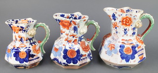 A set of 3 Ironstone graduated jugs with serpent handles 10", 9 1/2" and 8" 