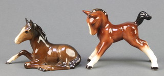 A Beswick figure of a reclining horse 5", a Sylvac figure of a foal 5" 