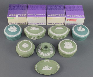 Six Wedgwood Jasperware boxes and covers, a ditto dish and chamber stick 