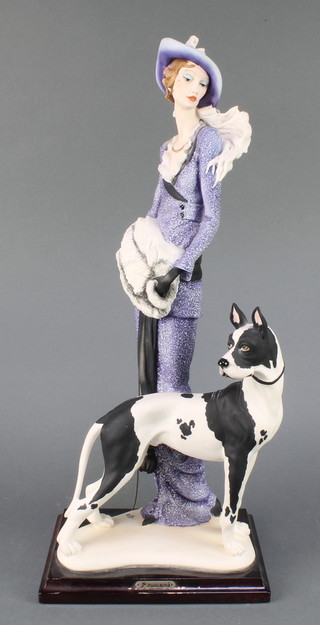 A composition Art Nouveau style figure of a lady and dog 18" 