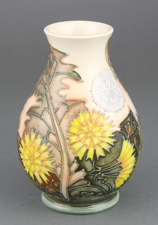 A modern Moorcroft baluster vase, the pink ground decorated with dandelions 243/250 5" 