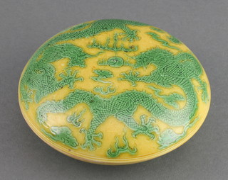 A good Chinese yellow ground seal paste box decorated with green dragons having an impressed Chien Lung mark to base 4"
