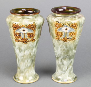 A pair of Royal Doulton oviform vases decorated with stylised flowers 6 3/4" 