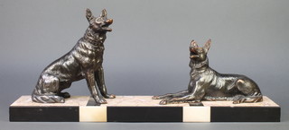 An Art Deco spelter and 3 colour marble figure group of 2 seated alsatians, raised on a 3 colour marble base 11"h x 25 1/2"w x 5 1/2"d 