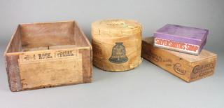 A rectangular wooden crate for Frys Cocoa, a rectangular wooden box for Cadbury's Cocoa Essence, cardboard carton for Wellington's Silversmith soap and a roll of Bluebell string 