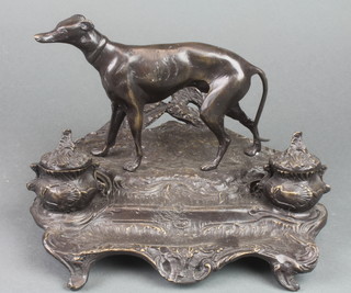 A Victorian style bronze twin bottle standish decorated a figure of a standing greyhound 7"h x 10"w x 8" together with 2 spelter figures of standing soldiers 12" (bases damaged) 