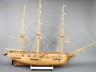 A wooden model of a The French Naval Sloop Astrolabe 30"h x 42"w x 8"