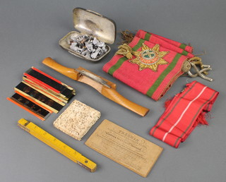 A 19th Century Friendly Society embroidered sash, a small quantity of correspondence relating to the Freedom of The City of Norwich, a printed label from Freeman Carvers, Gilders and Looking Glass Makers, a collection of lead figures in a metal spectacle case, a 19th Century carved ivory card case (f) and other minor items