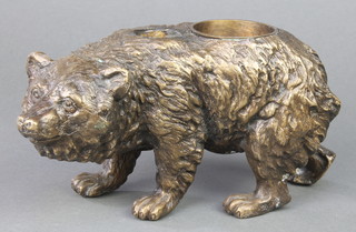 A gilt metal figure/inkwell of a walking bear, the back fitted 2 recesses 4" 