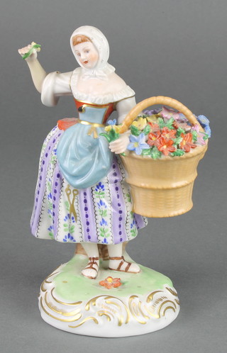 A 20th Century Dresden figure of a flower seller 5 1/2" 