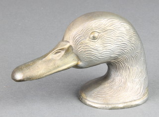 A French 1920's metal Ducky crown cork bottle opener in the form of a ducks head, the base marked Ducky Paris 4 1/2" 
