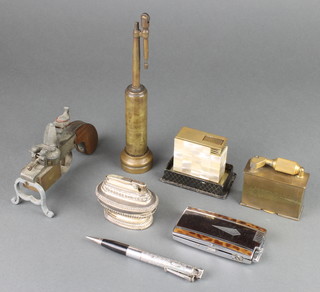 A brass Trench Art table lighter 9", a McMurdo brass lighter, a Ronson Queen Anne style table lighter and 4 other lighters 