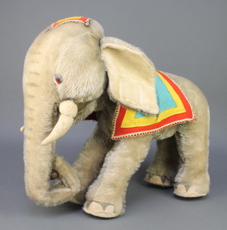A 1950's Merrythought figure of a standing elephant 20"h 