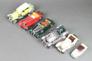 A Franklyn Mint model of a 1938 Alvis 4.3l motorcar, ditto 1935 Mercedes Benz, a 500k Special Roadster and 4 other model cars 