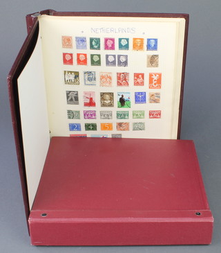 2 Stanley Gibbons Devon albums of mint and used World stamps Aiden, Australia, Belgium, Canada, Czechoslovakia, China, Congo, Cyprus, Denmark, Egypt France, GB, Hong Kong, Israel, Mongolia, Jamaica, Netherlands, Papua New Guinea, Poland, Portugal, Romania, St Vincents, Spain
