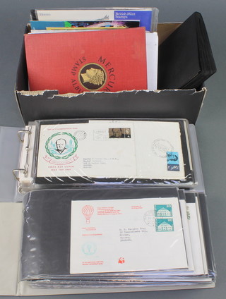 2 albums of GB first day covers, a shoe box containing a collection of presentation stamps and first day covers and a small collection of cigarette cards 