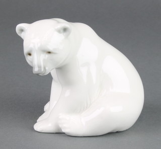 A Lladro figure of a seated Polar Bear cub 3 1/2" 