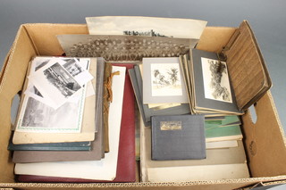 A collection of 1930's and later black and white photograph albums, group photographs etc 