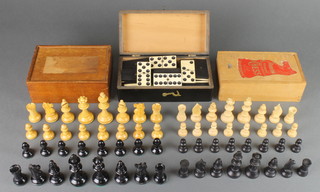 A bone and ebony sixes domino set contained in an Oriental lacquered case together with 2 Staunton's chess sets 