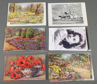 A quantity of various Annie L Pressland coloured postcards - country and garden scenes