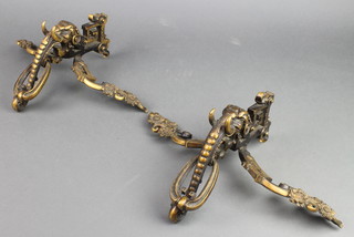 A large pair of pierced gilt ormolu furniture/urn mounts decorated elephants heads 11" x 16"  