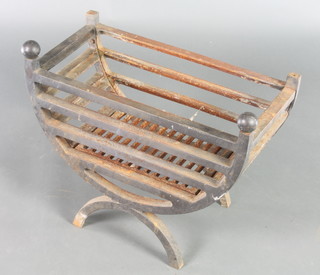 A cast iron U shaped fire basket 16" x 22" x 11"