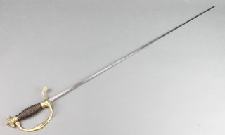 A Solingen 19th Century German court sword with brass grip, horn handle  and 31" blade 
