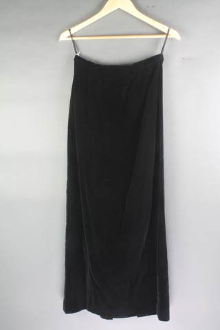 A Sportsville 1950's black and red hooped skirt labelled 24, together with a ditto black velvet full length skirt labelled 28 