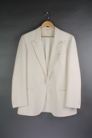 A gentleman's white single breasted dinner jacket by Moss Bros. approx. size 38 together with a safari jacket by Esqui of Hong Kong approx. size 40 (some small moth hole and slight stain) 