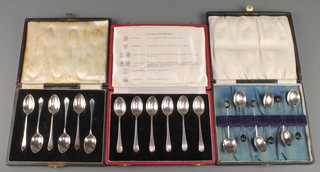 Six silver coffee spoons 1950, mixed assay offices, cased, 6 silver bean end coffee spoons Birmingham 1933 cased and and 6 silver coffee spoons Edinburgh 1959, 38 grams, cased 