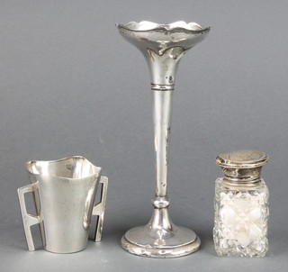 A tapered silver spill vase Birmingham 1939 6 1/2", a silver mounted scent and a ditto cup holder 