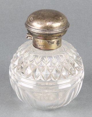 A Victorian silver mounted circular cut glass scent, London 1859? marks rubbed