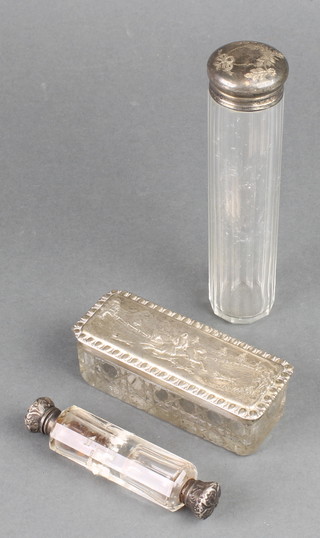 An Edwardian rectangular cut glass and silver lidded box with hunting scene, rubbed marks, a double ended scent and a toilet jar 