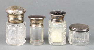 An Edwardian silver topped scent Birmingham 1907 and 3 others
