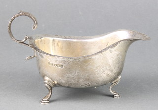 A silver sauce boat with cut rim and pad feet Sheffield 1923, 112 grams 