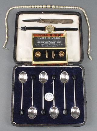 A silver mounted pocket knife, a cased set of 6 silver plated coffee spoons and minor items