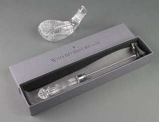 A Waterford Crystal candle snuffer, ditto paperweight in the form of a golf club 