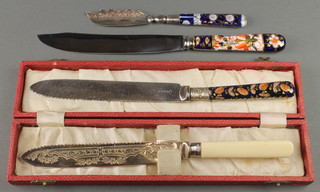 A Victorian silver butter knife with Japan pattern handle and 3 other knives