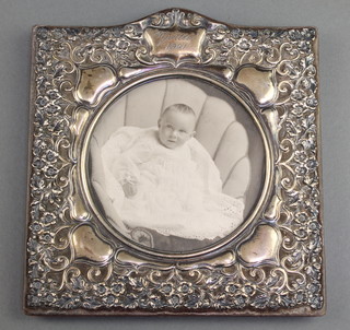 A Victorian repousse silver photograph frame with inscription Birmingham 1900 6 1/2" 