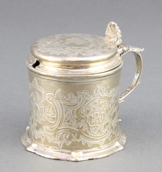 A Victorian silver mustard pot with chased scroll decoration London 1851, 118 grams
