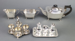A silver plated 3 piece tea set with ebony mounts and minor plated items 