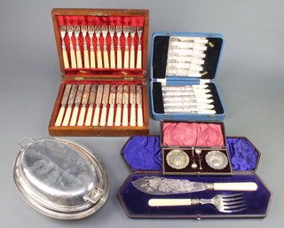 A cased pair of Edwardian silver plated chased fish servers and 3 box sets together with a plated entree
