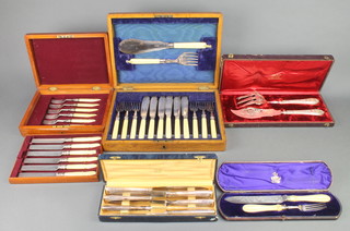 A cased pair of Edwardian silver plated fish servers and other cased sets