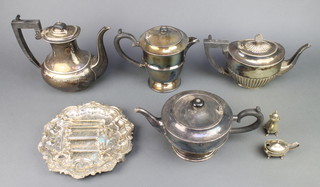 A silver plated coffee pot and minor plated wares including a pair of plated knife rests 