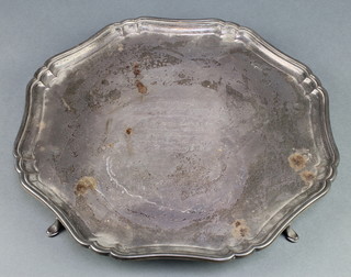 A silver salver with pie crust rim on pad feet, 15", Sheffield 1924, 1308 grams