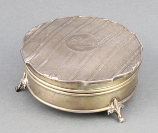 A silver trinket box with engine turned decoration on scroll feet Birmingham 1923 3 1/2" 