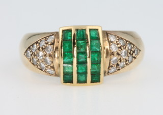 A 9ct yellow gold emerald and diamond cocktail ring size R 